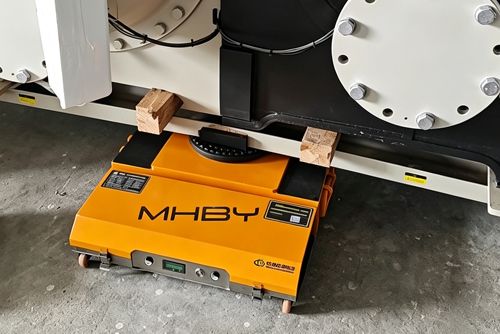 How do you use an electric load-moving skate?