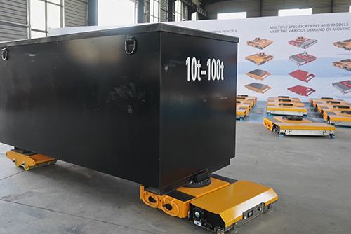 What are the advantages of electric heavy-duty transport carts when moving heavy equipment?